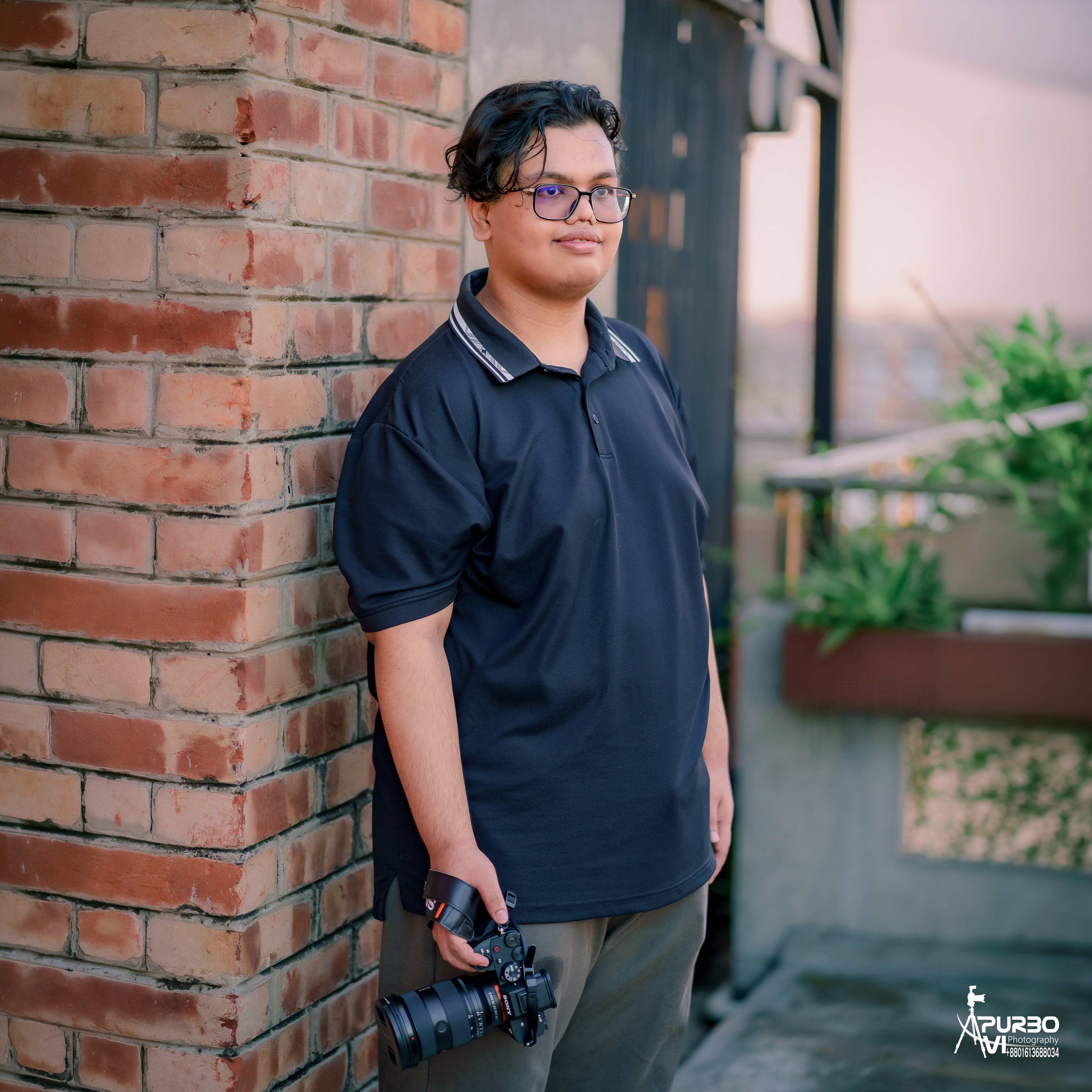 Ahnaf Tanzir Orhan holding a camera